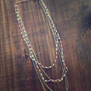 long gold beaded layered necklace